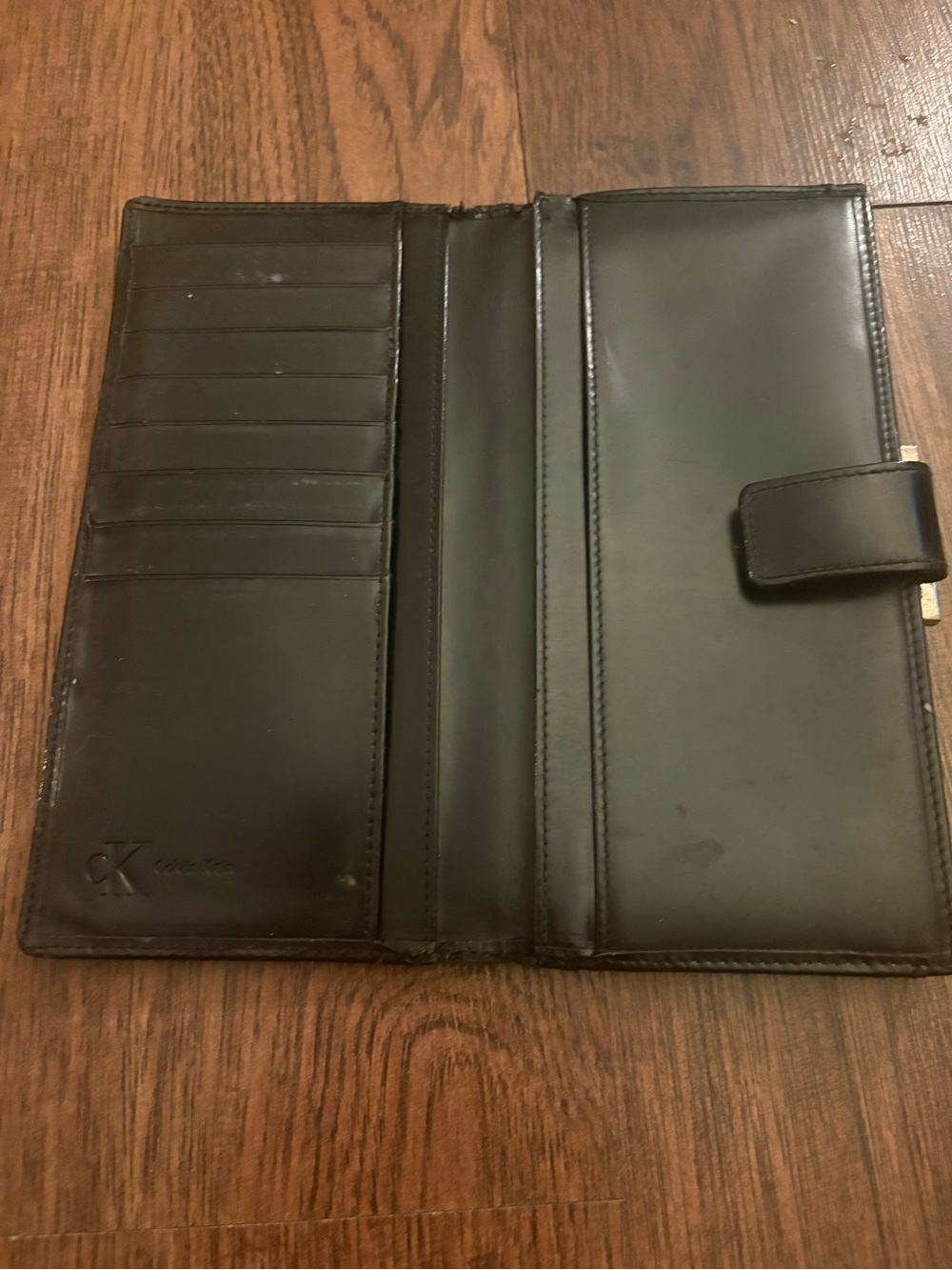 Calvin Klein Black Leather Bi-Fold Wallet with Snap Tab